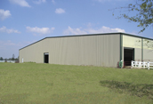 Agricultural buildings gallery featuring high-quality steel farm structures for equipment and livestock storage.